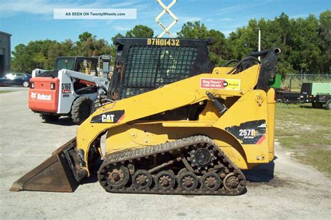 stuck bucket release skid steer caterpillar 0299 d|Self.